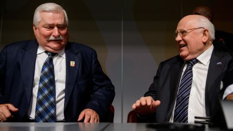 Gorbachev laughs with former Polish president Lech Walesa at the opening of a conference to celebrate the 20th anniversary of Green Cross International in 2013.