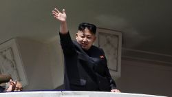 North Korea's leader Kim Jong-Un waves at the end of a 2012 military parade to mark 100 years since the birth of his grandfather Kim Il-Sung.