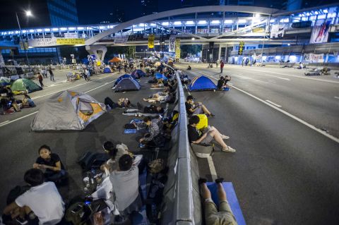 Pro-democracy protesters remain scattered at the protest site in Admiralty on Thursday, October 9. The government canceled talks that day after protest leaders urged supporters to keep up the occupation. 