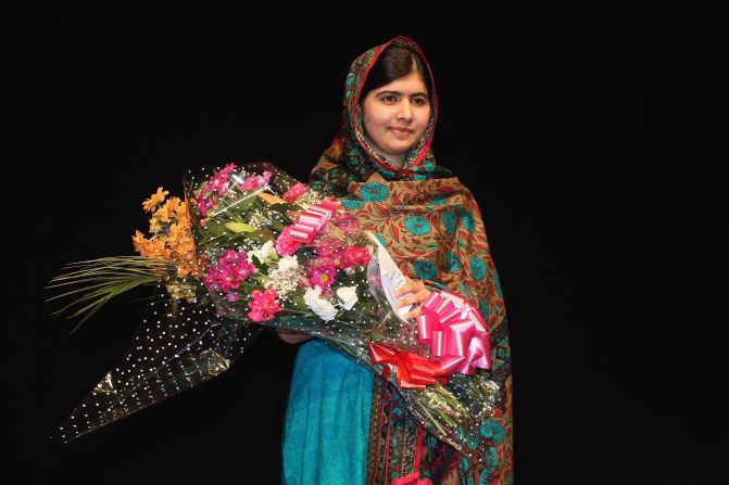 Malala Yousafzai poses on stage in Birmingham, England, after she was announced as <a href="index.php?page=&url=http%3A%2F%2Fwww.cnn.com%2F2014%2F10%2F10%2Fworld%2Feurope%2Fnobel-peace-prize%2Findex.html">a recipient of the Nobel Peace Prize</a> on Friday, October 10, 2014. Two years earlier, she was shot in the head by the Taliban for her efforts to promote education for girls in Pakistan. Since then, after recovering from surgery, she has taken her campaign to the world stage.