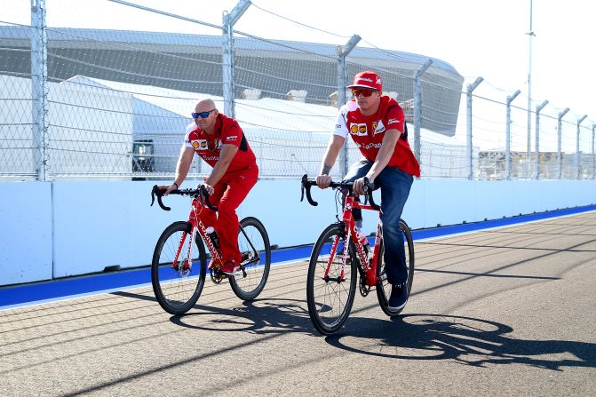 Alonso's current teammate Kimi Raikkonen (right) cycles around the new track at Sochi, which winds around the renovated resort town's Olympic park and is an unfamiliar circuit for the drivers. 