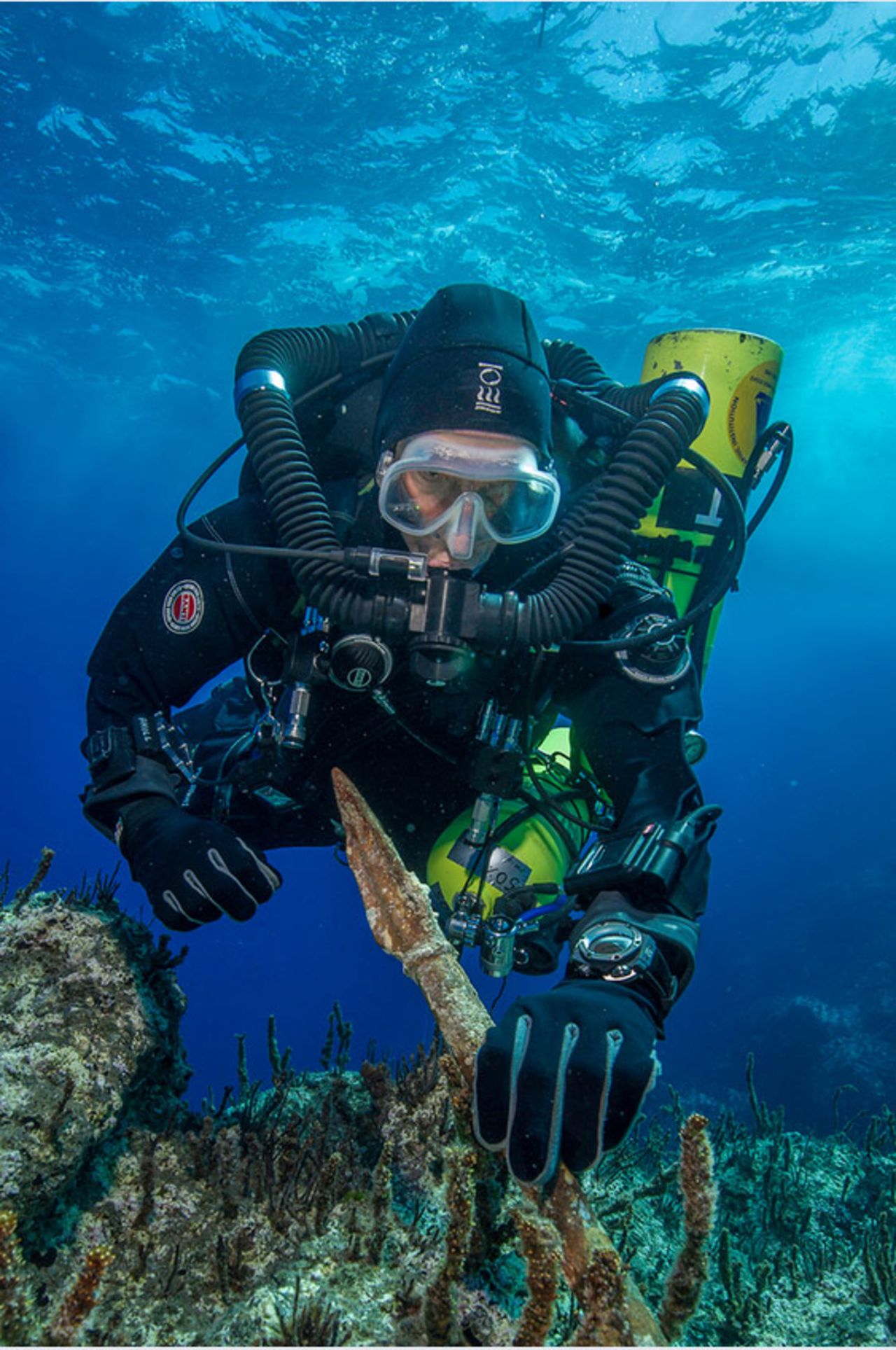 "Return to Antikythera" project chief diver Philip Short is pictured inspecting the magnificent two-meter-long bronze spear reclaimed from the shipwreck, which archaeologists say was once part of a life-size warrior statue.