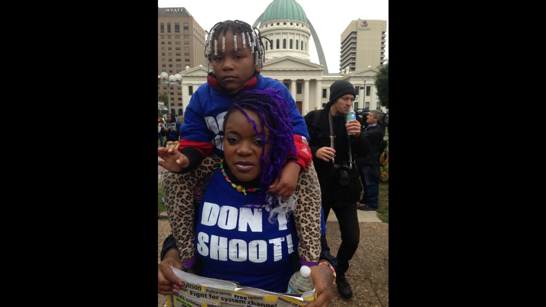 Sara Benjamin, 23, and daughter Imari, 5, traveled from Baltimore to attend the Justice For All rally in St Louis.