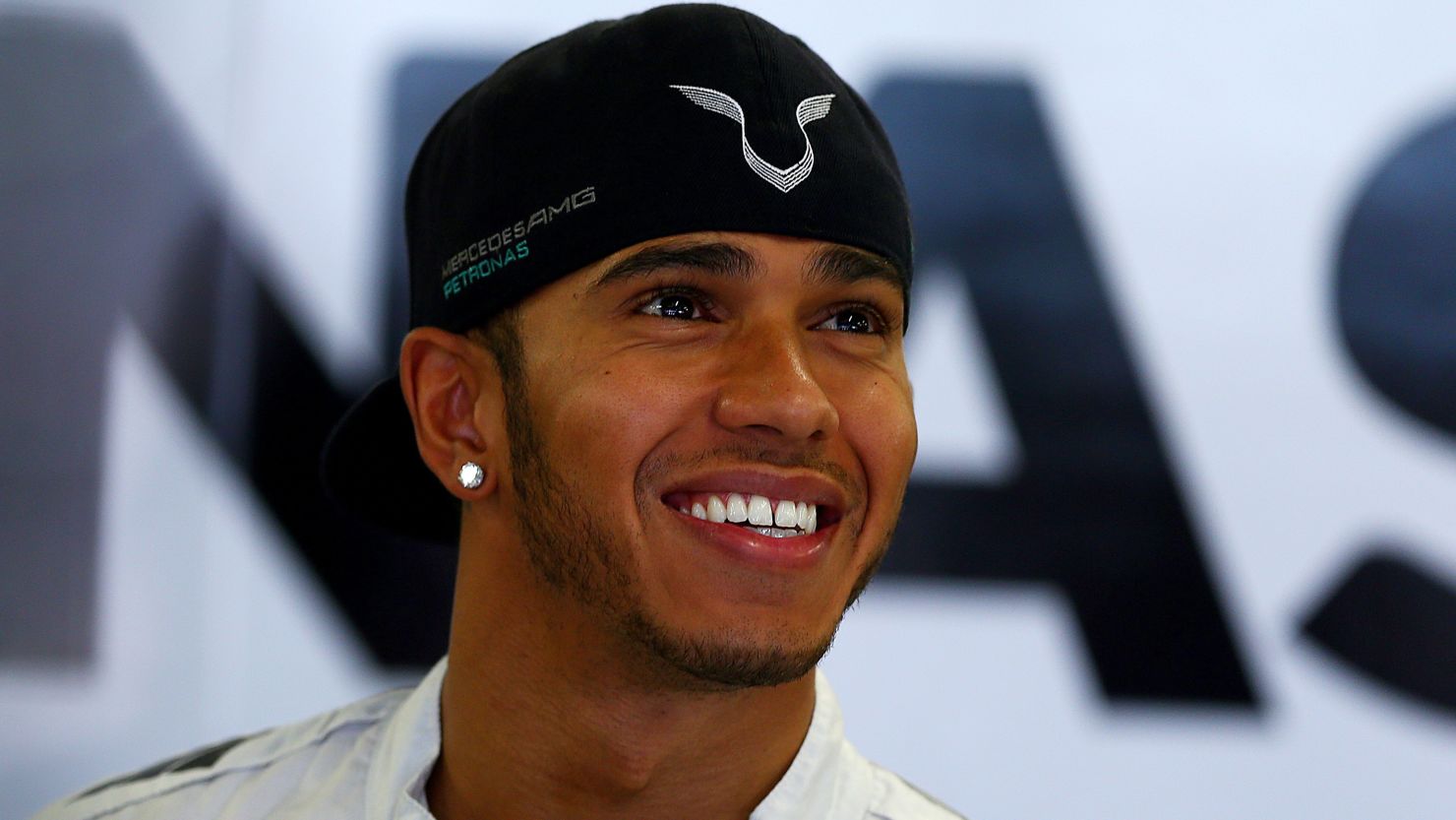  Lewis Hamilton smiles in the garage during final practice ahead of the Russian Formula One Grand Prix.