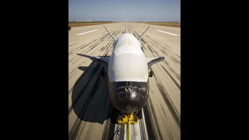 The X-37B Orbital Test Vehicle, the Air Force's unmanned, reusable space plane, landed at Vandenberg Air Force Base, Calif., June 16, 2012. OTV-2, which launched from Cape Canaveral Air Force Station, Fla., March 5, 2011, conducted on-orbit experiments for 469 days during its mission. (Boeing photo/ Paul Pinner)