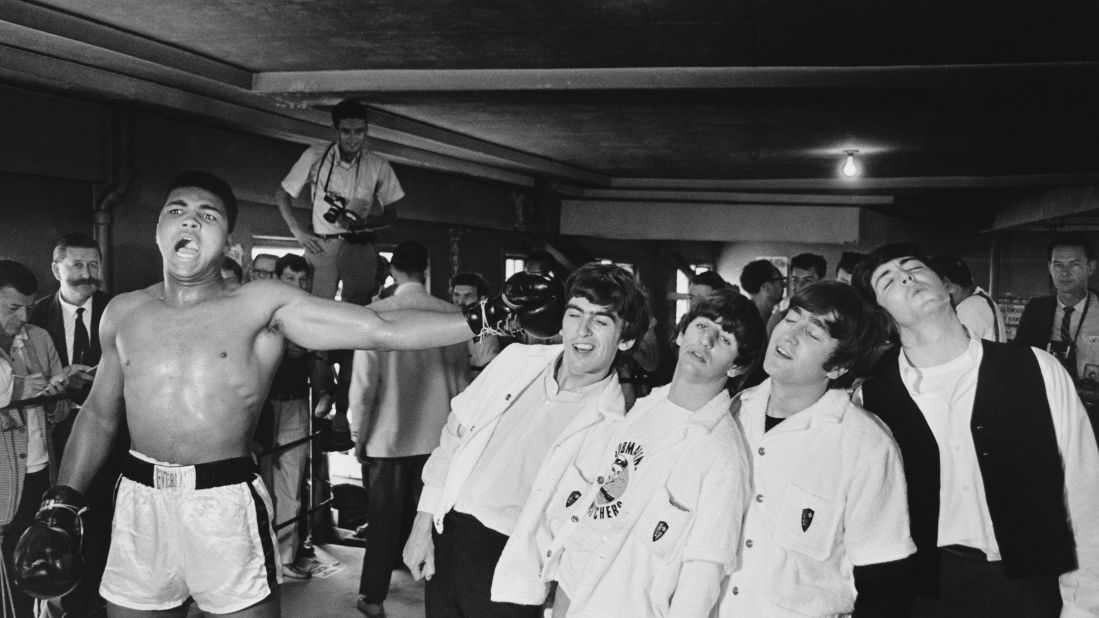 Ali poses for a picture with The Beatles in Miami, during the run-up to his heavyweight title fight against Sonny Liston in 1964.