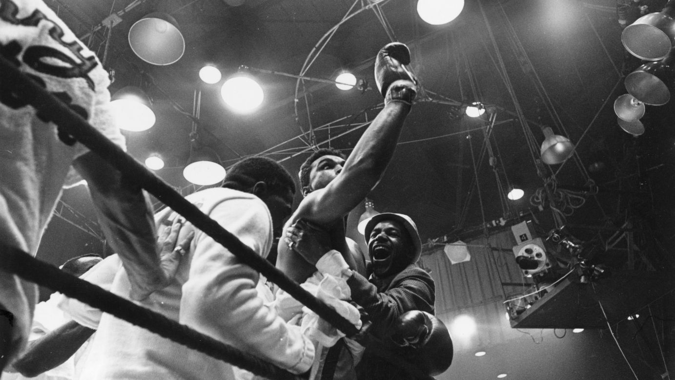Ali celebrates after defeating Liston in Miami on February 25, 1964. Upon becoming world heavyweight champion for the first time, Ali proclaimed, "I am the greatest!"