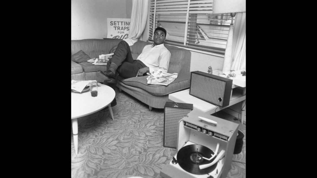 Ali relaxes after his win over Liston in 1964. At 22, he became the youngest boxer to take the heavyweight title from a reigning champion.