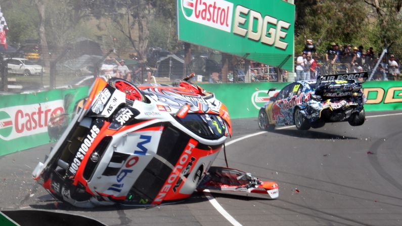 Warren Luff's car is seen on its side after crashing with Craig Lowndes during practice for the Bathurst 1000, a V8 Supercars race in Bathurst, Australia, on Saturday, October 11. Both drivers were OK.