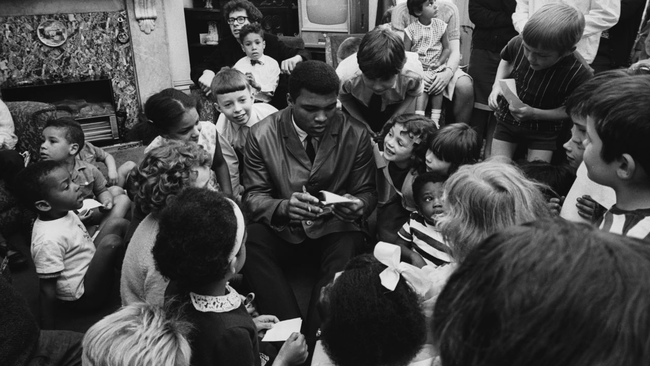 Ali visits a children's home in London in May 1966.