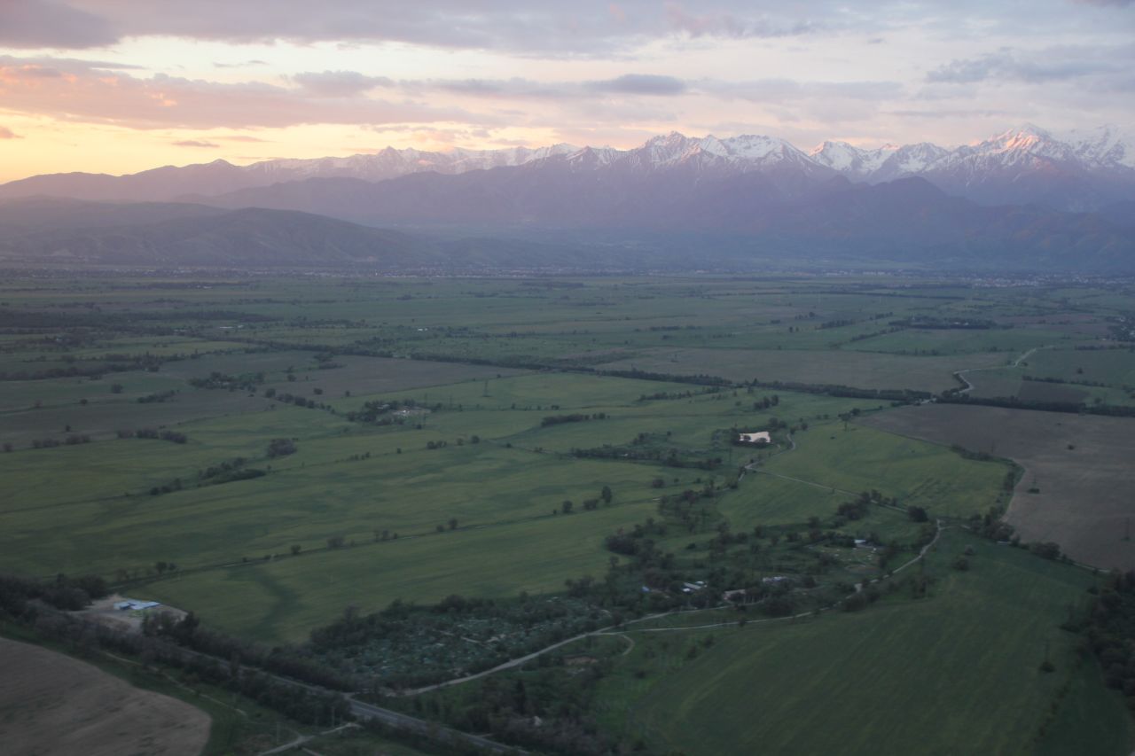 The Tian-Shan, Central Asia's longest system of mountain ranges, is set aglow by the pastel sky draping over <a href="http://ireport.cnn.com/docs/DOC-817792">Almaty, Kazakhstan</a>.
