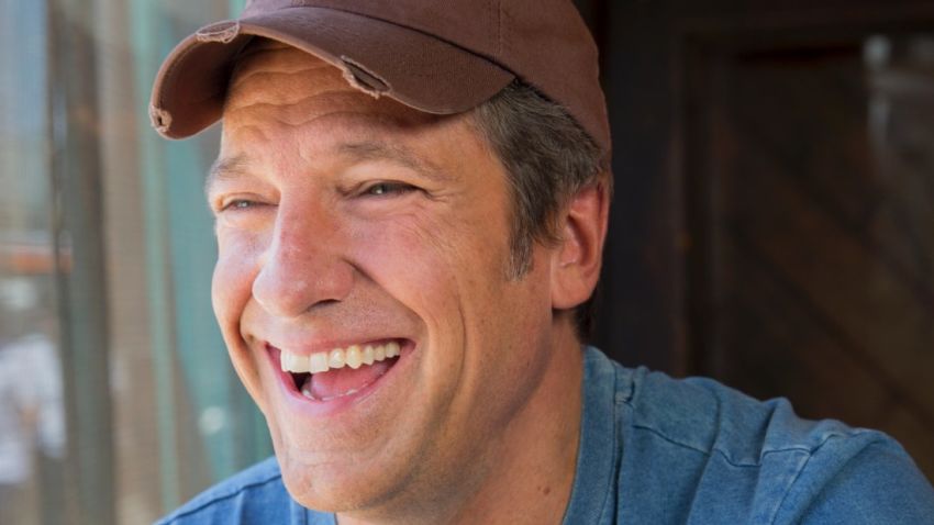 mike rowe smiling hat