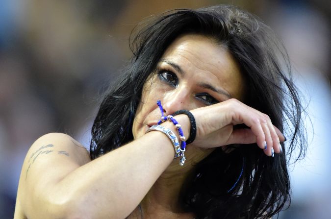 Zanetti retired at the end of last season after 19 years playing for the club. An Inter fan is pictured wiping away a tear after the 40-year-old Argentine said farewell to supporters following a 4-1 win over Lazio at the San Siro in May.