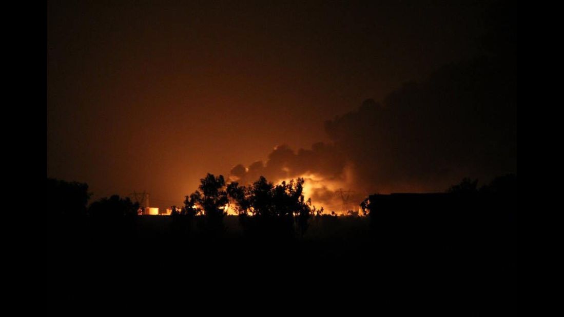 A Baiji oil refinery burns after an alleged ISIS attack in northern Selahaddin, Iraq, on Thursday, July 31.