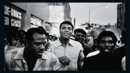 Ali walks through the streets of New York with members of the Black Panther Party in September 1970. Ali was sentenced to five years in prison and his championship title was revoked after he was convicted of draft evasion upon his refusal to serve in Vietnam as a conscientious objector in 1967. The decision was overtuned in 1971, but Ali became a figurehead of resistance and a hero of the people. 