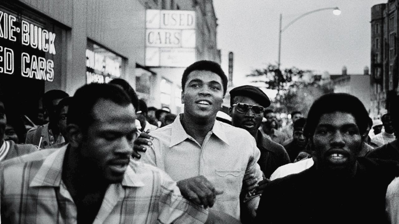 Ali walks through the streets of New York with members of the Black Panther Party in September 1970. Ali was sentenced to five years in prison for his refusal to enter the draft, and he was also stripped of his boxing title. The U.S. Supreme Court overturned Ali's conviction in 1971, but by that time Ali had already become a figurehead of resistance and a hero to many. <a href="http://www.cnn.com/2016/06/02/sport/muhammad-ali-three-days/index.html" target="_blank">Related: Photographer fondly recalls his three days with Ali</a>