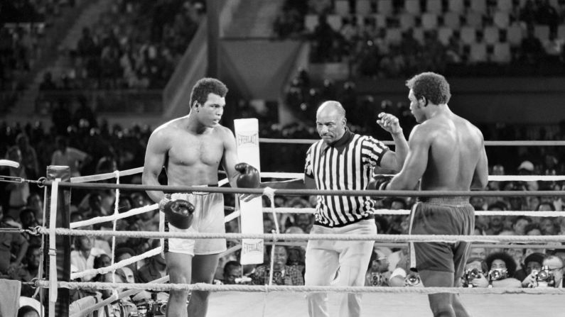 Ali and Foreman fight October 30, 1974, in what was billed as <a href="index.php?page=&url=http%3A%2F%2Fwww.cnn.com%2F2014%2F10%2F30%2Fworldsport%2Fgallery%2Frumble-in-the-jungle-40-years%2Findex.html" target="_blank">"The Rumble in the Jungle."</a> Ali, a huge underdog, knocked out Foreman in the eighth round to regain the title that was stripped from him in 1967.