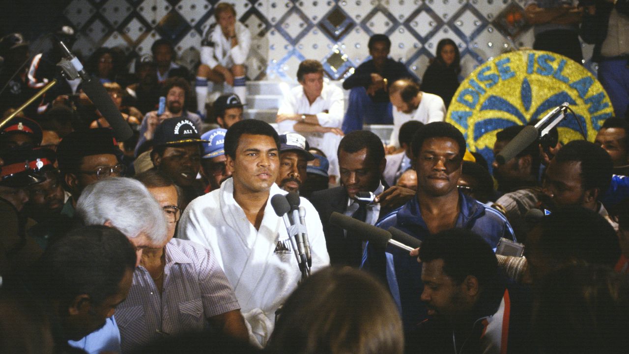 Ali and Trevor Berbick weigh in for their fight in the Bahamas in December 1981. Berbick won by unanimous decision. It was Ali's last professional fight.
