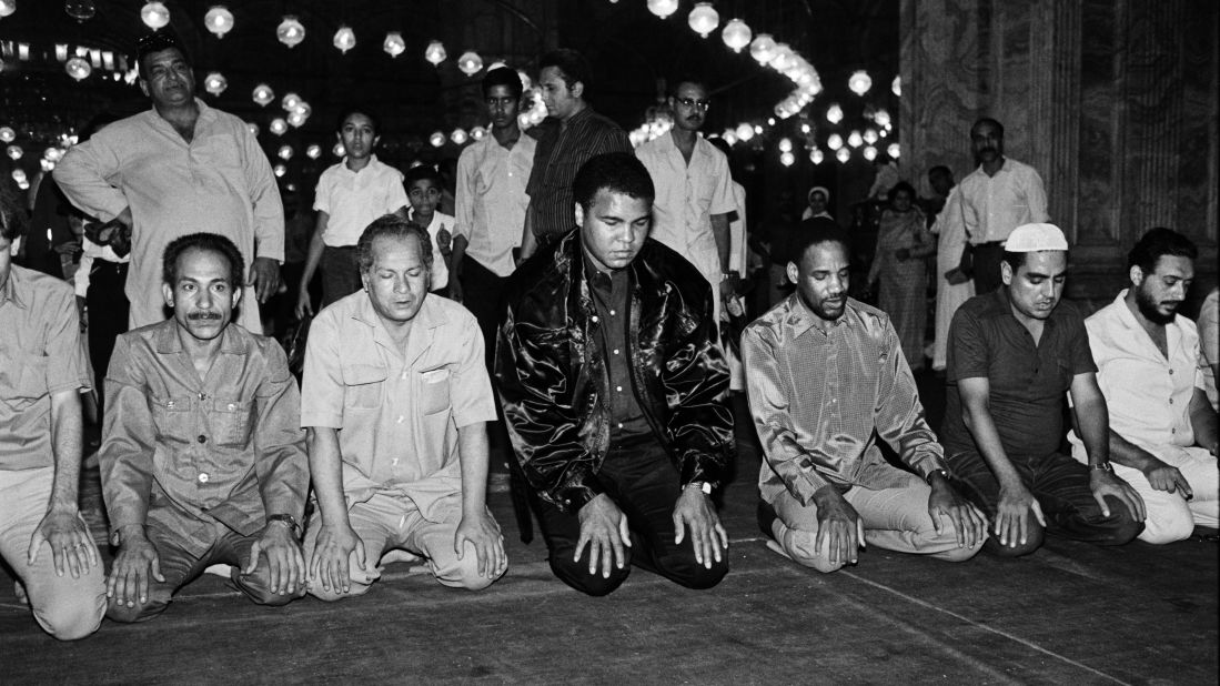 Ali prays at a mosque in Cairo in October 1986. Two years prior, he revealed that he had Parkinson's syndrome, a disorder of the central nervous system.