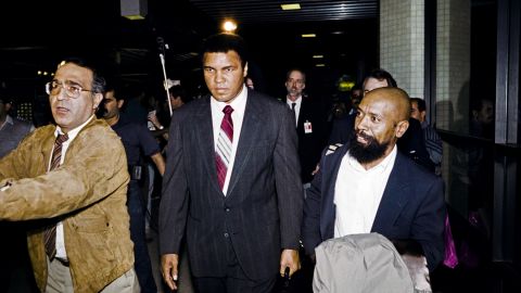 In 1990, Ali met with Iraqi President Saddam Hussein to negotiate the release of 15 American hostages in Iraq and Kuwait. Here, Ali leaves Iraq with the hostages on December 2, 1990.