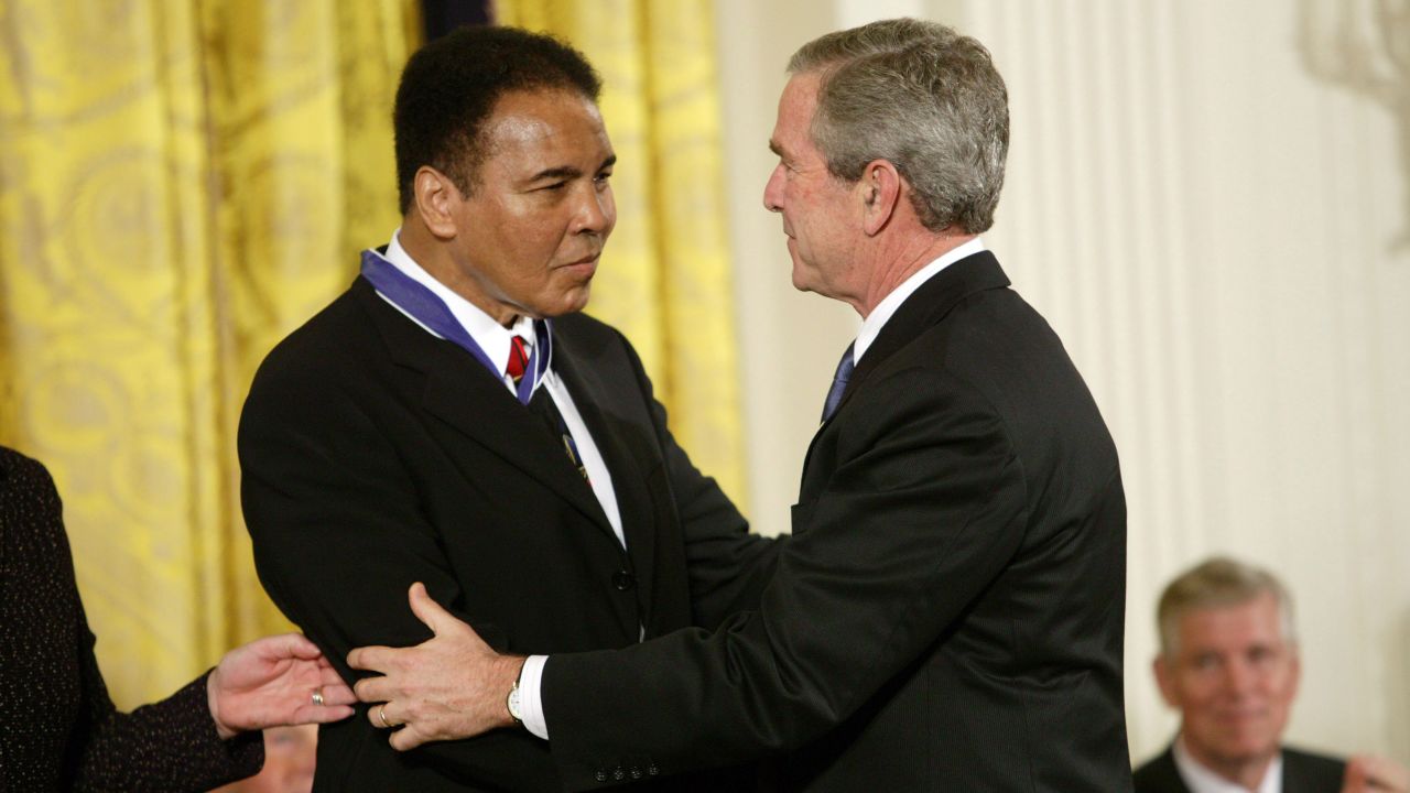 U.S. President George W. Bush presents Ali with the Presidential Medal of Freedom, the nation's highest civilian honor, on November 9, 2005.