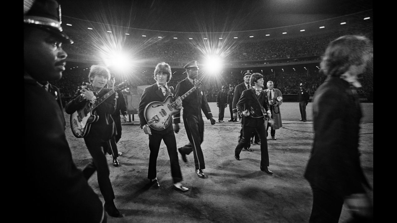 The Beatles performed their last American concert at Candlestick Park in 1966. Marshall caught them both on stage and off.