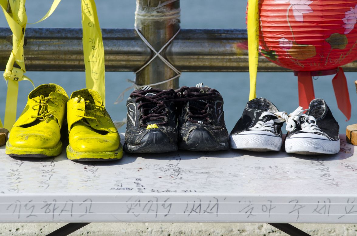 Shoes believed to belong to the missing and the deceased are on display at the harbor.