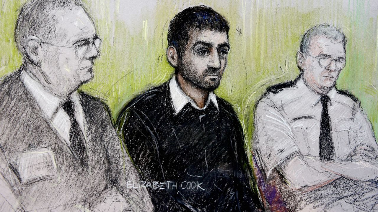A sketch court sketch shows Erol Incedal (C) seated at the Central Criminal Court in London on October 13.