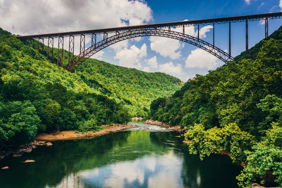 Some 450 BASE jumpers will jump off New River Gorge Bridge in Fayetteville, West Virginia, on Saturday, October 18, as part of Bridge Day 2014, marking the 35th year of the annual celebration. BASE is an acronym that stands for these fixed points: building, antenna, span and earth.