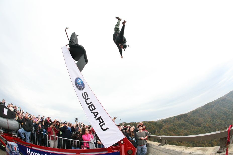 Bridge Day introduced a human catapult system in 2012 to launch a smaller, select group of jumpers up and out from the bridge railing. These jumpers used it in 2013. 