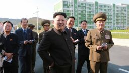 This undated picture released from North Korea's official Korean Central News Agency (KCNA) on October 14, 2014 shows North Korean leader Kim Jong-Un (C) smiling as he inspects a newly-built housing complex in Pyongyang. Kim Jong-Un has finally resurfaced with the help of a walking stick after a prolonged, unexplained absence that fuelled rampant speculation about his health and even rumours of a coup in the nuclear-armed state. AFP PHOTO / KCNA via KNS REPUBLIC OF KOREA OUT
THIS PICTURE WAS MADE AVAILABLE BY A THIRD PARTY. AFP CAN NOT INDEPENDENTLY VERIFY THE AUTHENTICITY, LOCATION, DATE AND CONTENT OF THIS IMAGE. THIS PHOTO IS DISTRIBUTED EXACTLY AS RECEIVED BY AFP.
---EDITORS NOTE--- RESTRICTED TO EDITORIAL USE - MANDATORY CREDIT "AFP PHOTO / KCNA VIA KNS" - NO MARKETING NO ADVERTISING CAMPAIGNS - DISTRIBUTED AS A SERVICE TO CLIENTSKNS/AFP/Getty Images