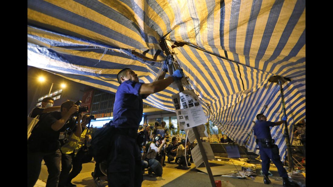 Riot police remove barricades on October 17.