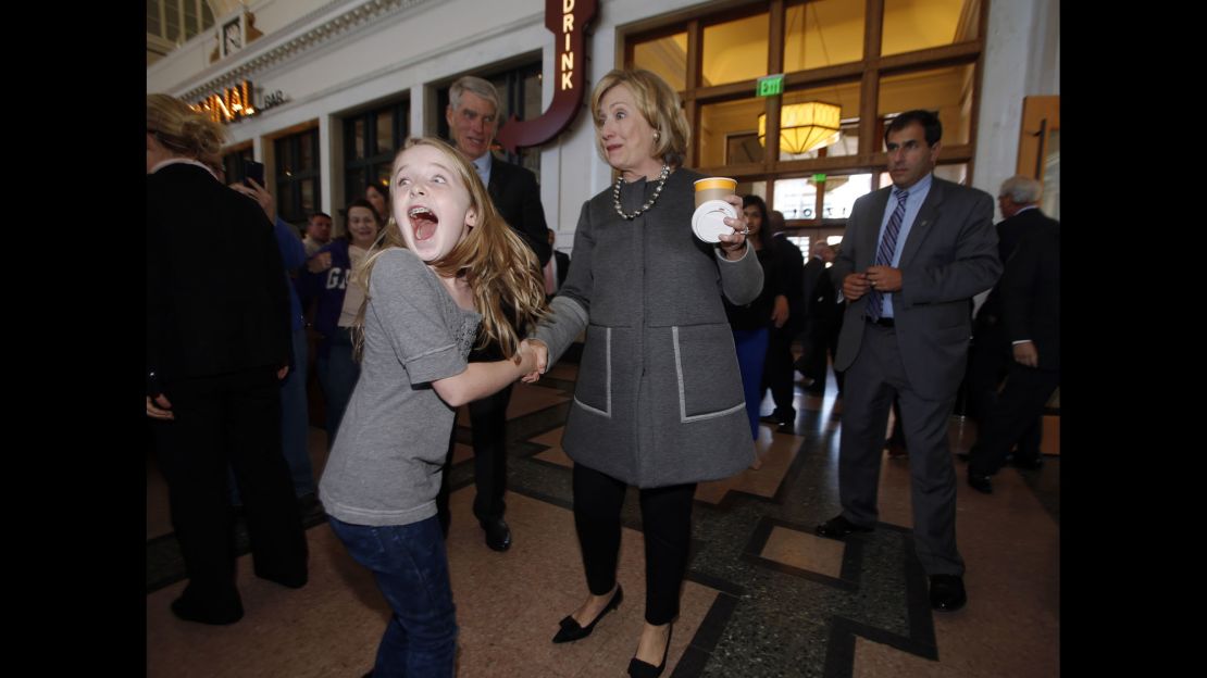 Ten-year-old Macy Friday reacts to meeting Hillary Clinton as Clinton campaigns for U.S. Sen. Mark Udall during a stop in the newly-renovated Union Station in Denver on Monday, October 13.