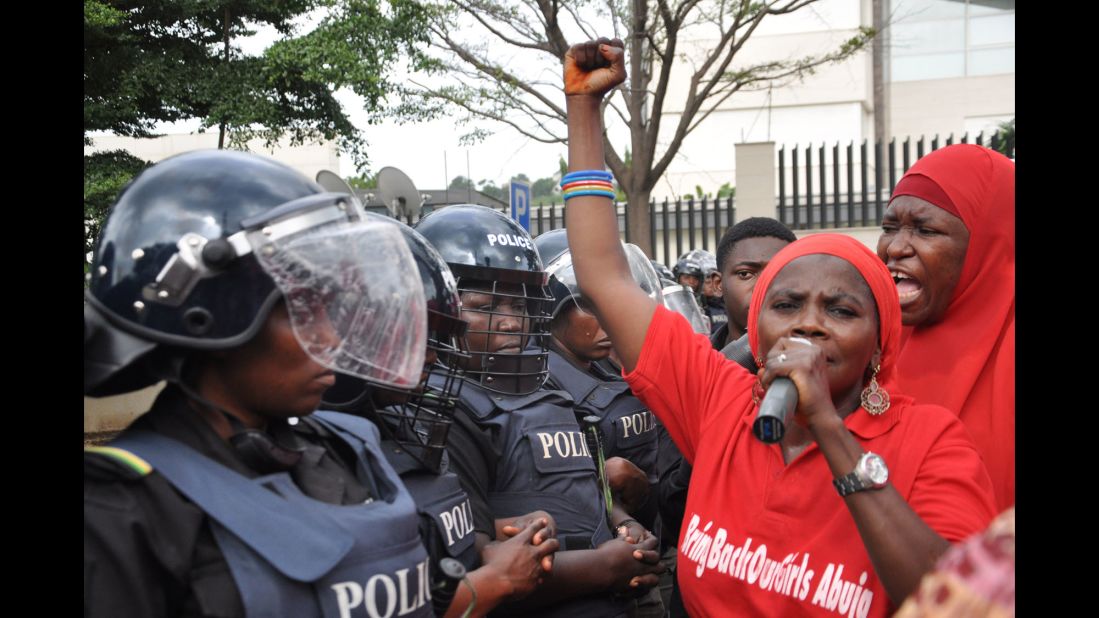 Police in riot gear block a route in Abuja on October 14, 2014, during a demonstration calling on the Nigerian government to rescue schoolgirls kidnapped by Boko Haram. In April, more than <a href="http://www.cnn.com/2014/04/15/world/africa/nigeria-girls-abducted/">200 girls were abducted</a> from their boarding school in northeastern Nigeria, officials and witnesses said.