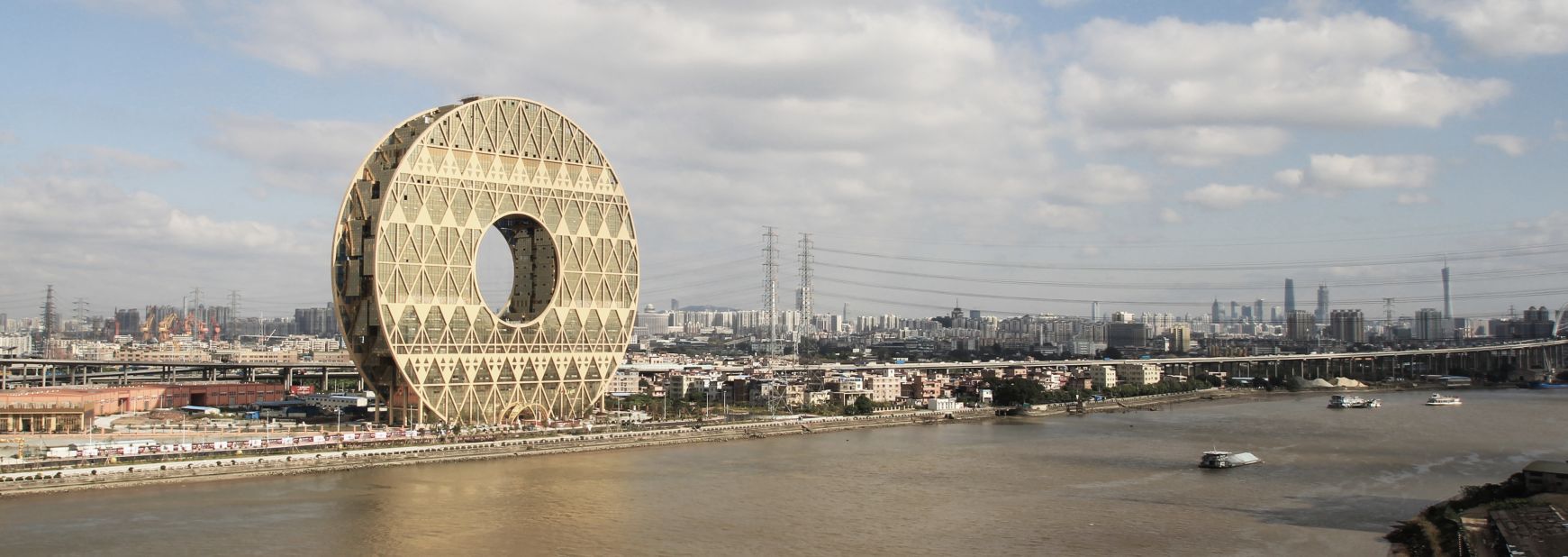 Memorable architectural designs, already built in China, include the Guangzhou Circle, home to the Guangdong Plastic Exchange. According to Italian architecture firm A.M. Progetti, the design is inspired by ancient jade discs.