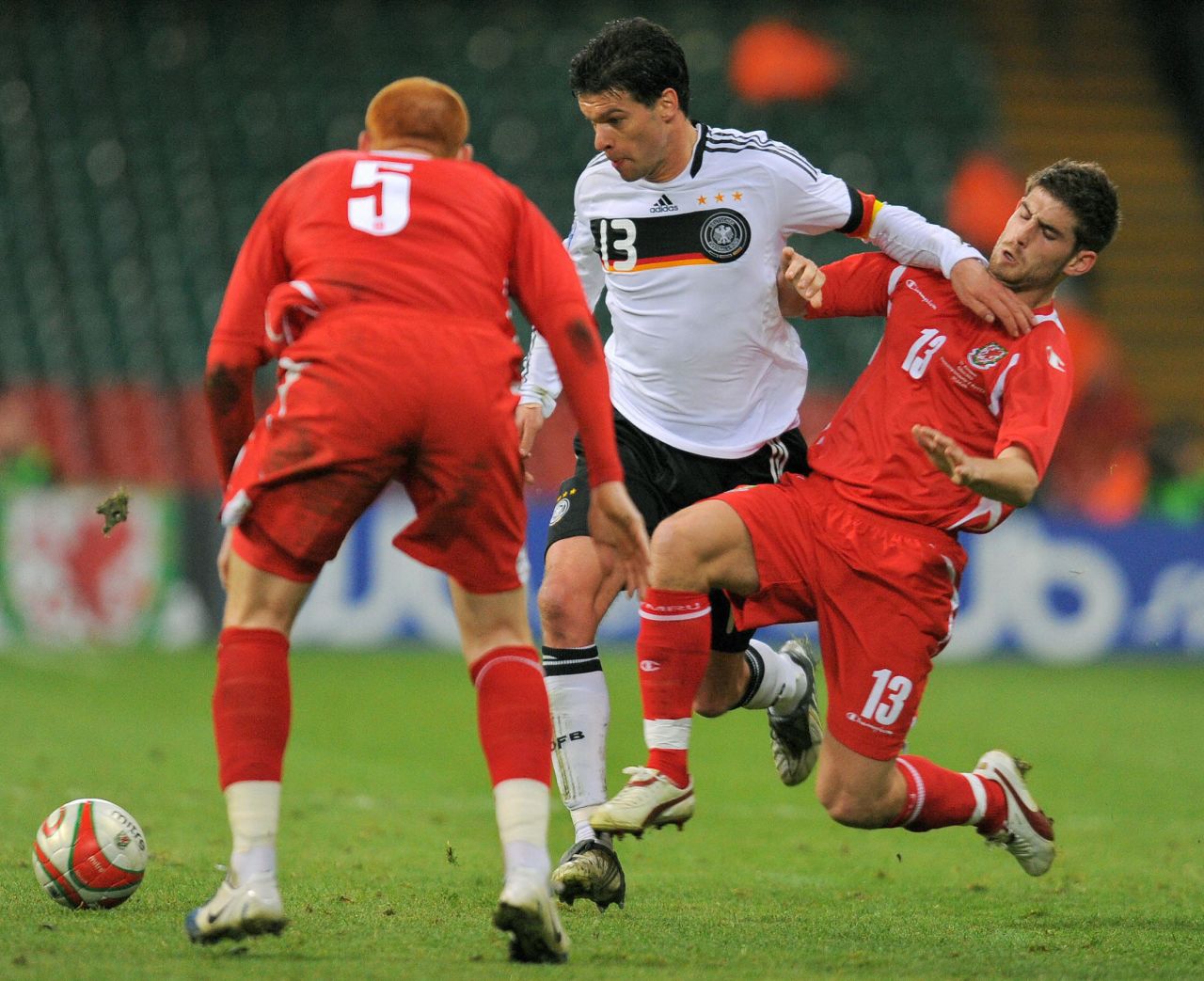 Evans (right) played for Wales on 13 occasions between 2008 and 2011.
