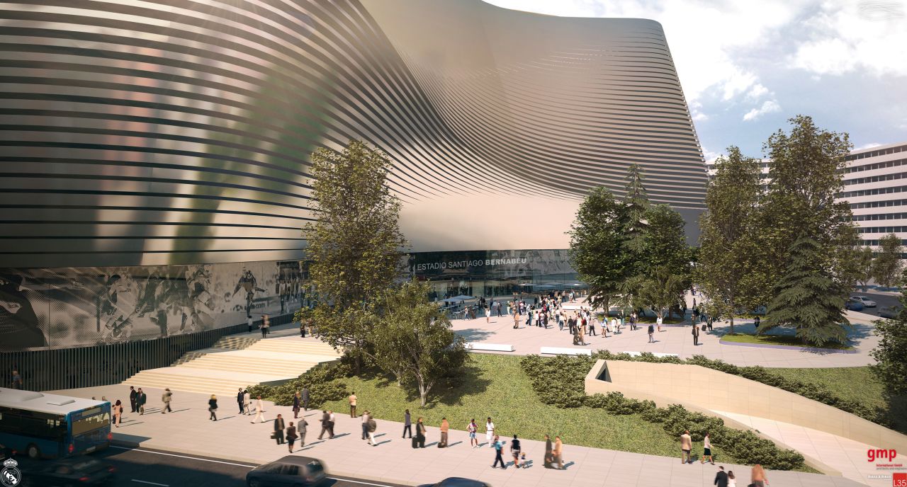 Architectural firm Gerkan, Marg and Partners says the metallic skin will allow a changing perception of the arena by pedestrians 'depending on their position and movement.'