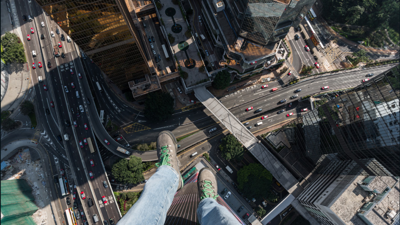 This sort-of selfie, taken by Russian thrillseekers On the Roofs in Hong Kong, would be frowned upon by police in their home country.