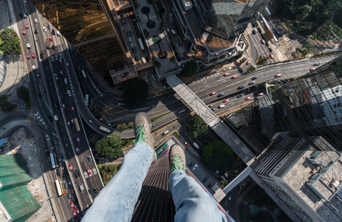This sort-of selfie, taken by Russian thrillseekers On the Roofs in Hong Kong, would be frowned upon by police in their home country.