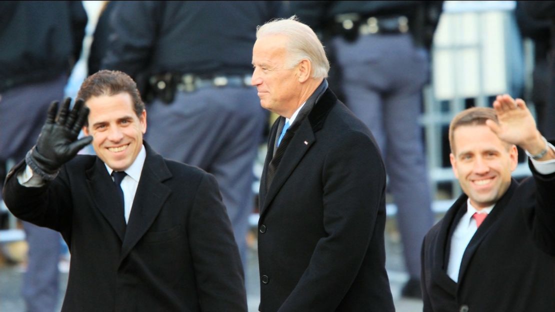 US President Trump pressed his Ukrainian counterpart Volodymyr Zelensky to investigate former US Vice President Joe Biden (pictured center), and his son Hunter (left).