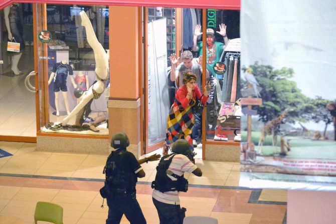 Mathenge captures a moment where armed security are able to safely secure the release of several trapped shoppers from inside Westgate. 