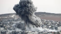 Heavy smoke rises following an airstrike by the U.S.-led coalition aircraft in Kobani, Syria, during fighting between Syrian Kurds and the militants of Islamic State group, as seen from the outskirts of Suruc, on the Turkey-Syria border, October 18.