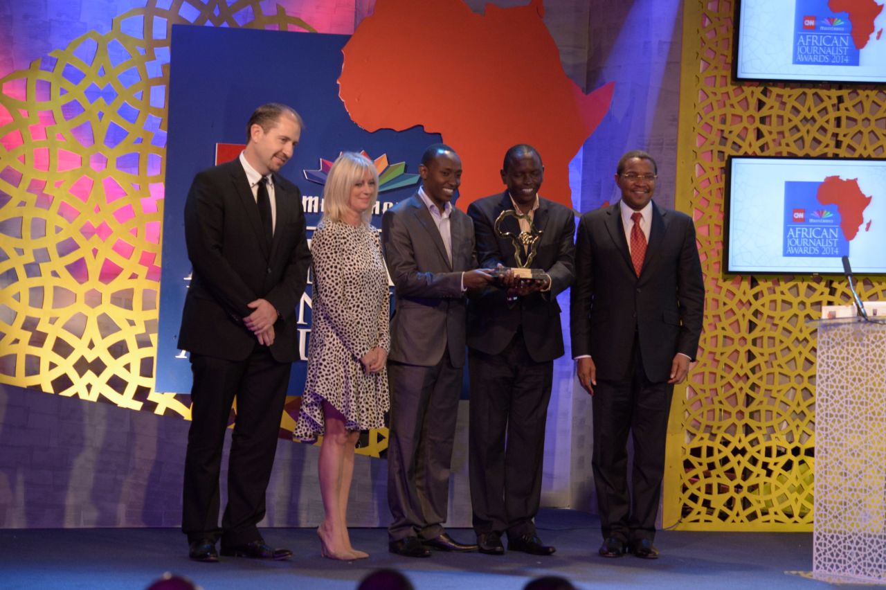  Deborah Rayner, senior vice president of international newsgathering TV and digital at CNN International presented Mathenge, pictured second from right, with the top award alongside Jakaya Kikwete, President of Tanzania and Nico Meyer, CEO MultiChoice Africa.