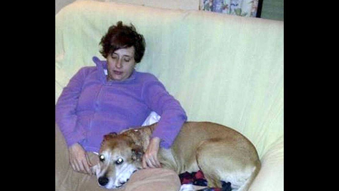 Teresa Romero Ramos and her dog, Excalibur.