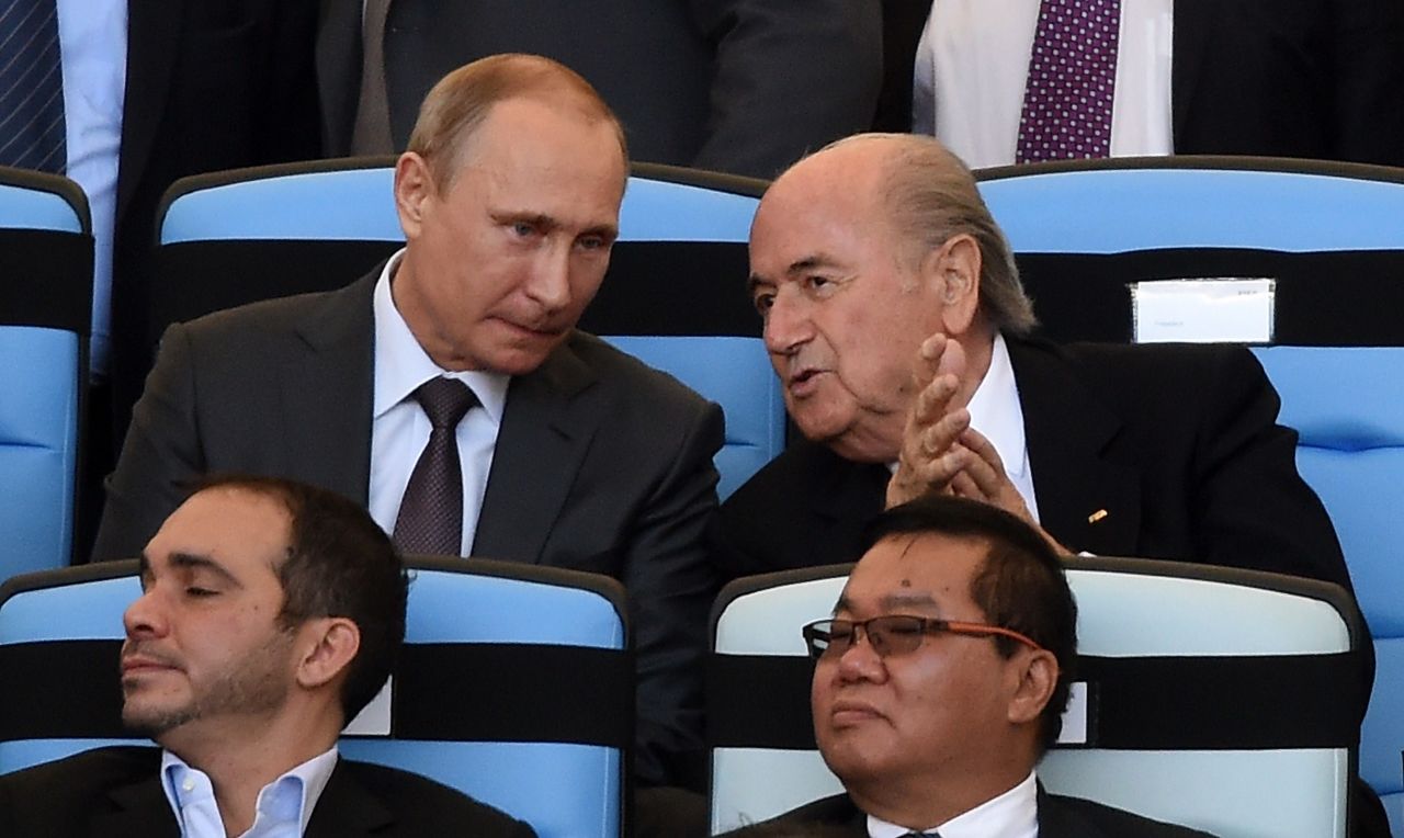 Putin and Blatter (back right) have forged a close relationship. The Swiss has led FIFA since 1998 but decided to stand down on June 2 as football's world governing body battled two corruption scandals.