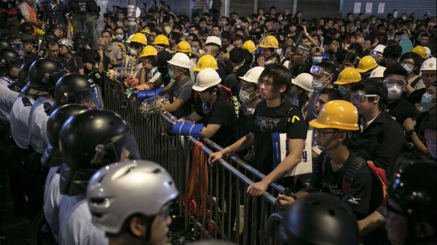 Police and protesters standoff against each other as tensions continue in in Hong Kong on Monday, October 20.
