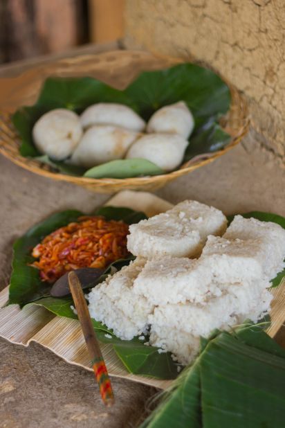 Kiribath is a special type of rice, cooked with thick coconut milk until it's creamy and sticky. It's served in slices, like cake.