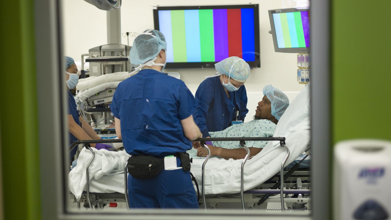 A kidney donor is prepared in an operating room before a kidney transplant at Johns Hopkins Hospital in Baltimore, Maryland. 
