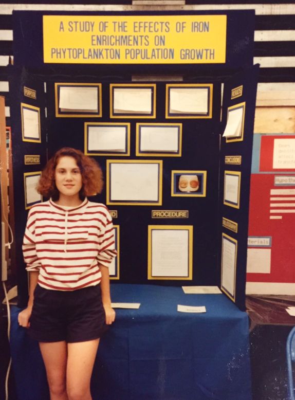 When Heather's mother took this picture of her at a science fair in 1991, she had no idea that Heather would grow up to become a NASA intern and that they would write two science books together. "When I was in middle school, my science research teacher took me under his wing and encouraged my research ambitions," says Heather Reis Tomasello from Florida. <br /><br />"This small investment of his time and encouragement multiplied exponentially, as I went on to internships at NASA and a large community hospital. I also competed at the international science fair, and paid for half of my college education with scholarships resulting from my science fair awards." 