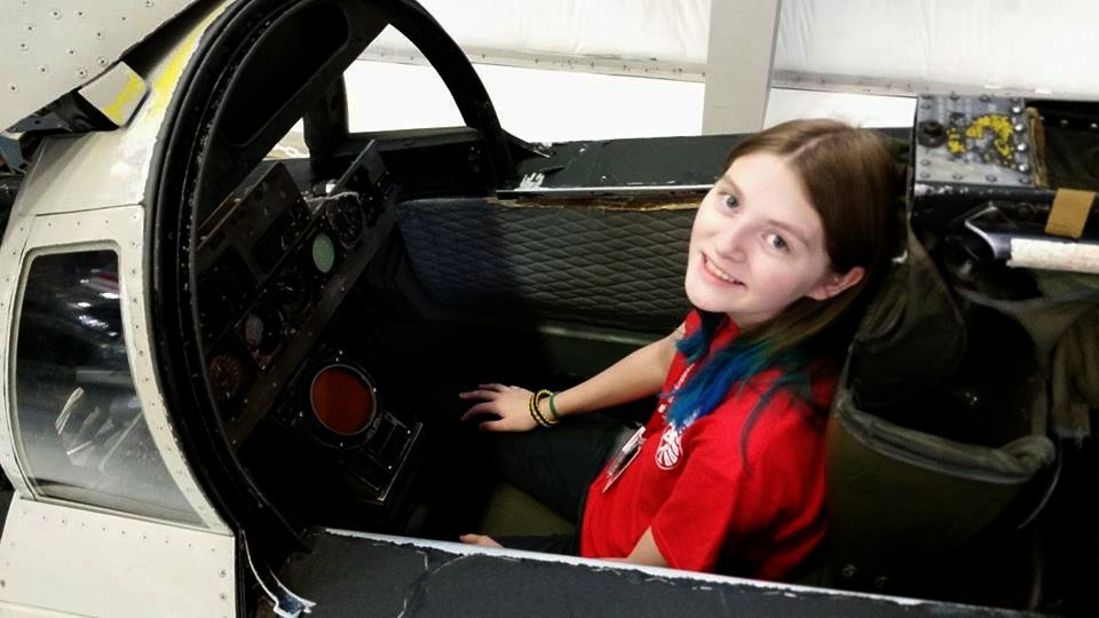 "Zoe breaks the norm for most senior girls in high school," added Lambert. "Instead of playing dolls as a child she preferred hanging out with the boys and building cardboard box spaceships." Zoe, who lost her father at nine years old, is pictured here at the National Flight Academy in August 2014. 